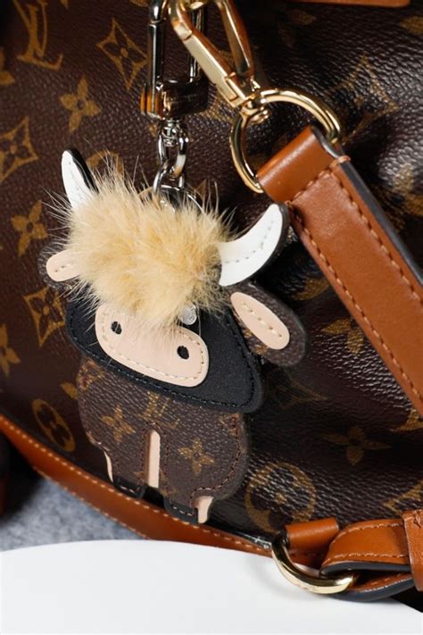 louis vuitton highland cow keychain|Louis Vuitton charms.